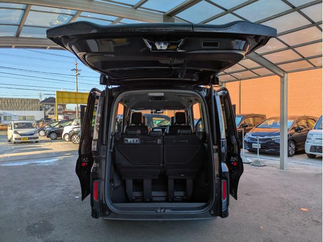 ステップワゴンスパーダ スパーダハイブリッド　Ｇ・ＥＸ　ホンダセンシング　純正ＳＤナビ　ＢＴオーディオ　ＵＳＢ入力端子　後席モニター　ＥＴＣ　全周囲・バックカメラ　　シートヒーター　ハーフレザーシート　オートライト　両側電動スライドドア　追従クルコン　車線逸脱警報装置（64枚目）