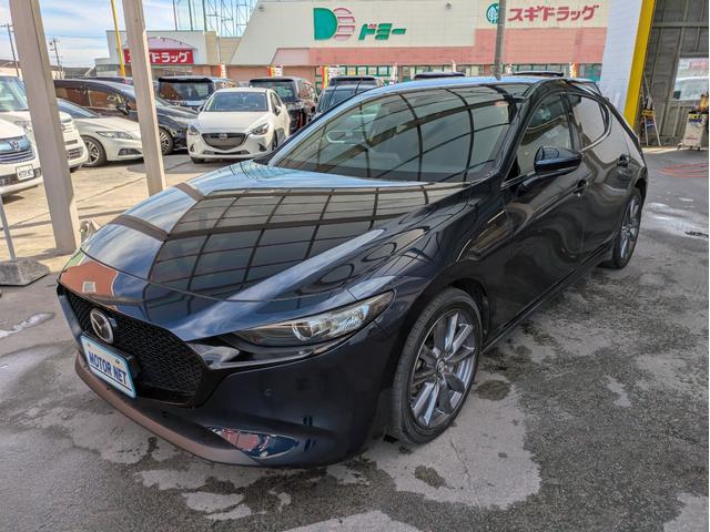 MAZDA3ファストバック 15Sツーリング 純正SDナビ BTオーディオ 全周囲・バックカメラ USB入力端子 障害物センサー 追従クルコン 衝突軽減ブレーキ 車線逸脱警報 オートライト LEDヘッドライト プッシュスタート 純正18インチAW(34枚目)