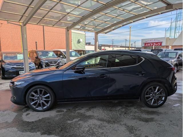 MAZDA3ファストバック 15Sツーリング 純正SDナビ BTオーディオ 全周囲・バックカメラ USB入力端子 障害物センサー 追従クルコン 衝突軽減ブレーキ 車線逸脱警報 オートライト LEDヘッドライト プッシュスタート 純正18インチAW(41枚目)