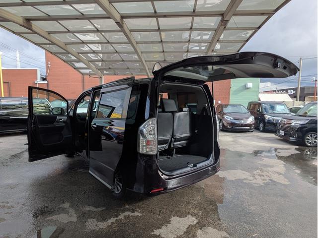 ヴォクシー ＺＳ　煌ＩＩ　純正ＨＤＤナビ　ＢＴオーディオ　ＥＴＣ　バックカメラ　フルセグＴＶ　ＣＤ／ＤＶＤ再生　両側電動スライドドア　オートライト　ＨＩＤヘッドライト　フロントフォグランプ　パドルシフト　ステアリングリモコン（59枚目）