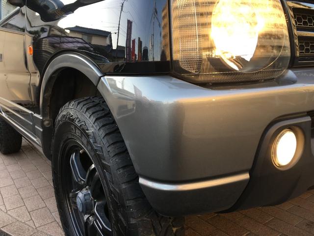 ランドベンチャー 禁煙車 4WD オフロードタイヤ ターボ ETC ナビ DVD シートヒーター ハーフレザーシート 純正16インチAW(11枚目)
