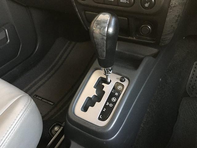 ランドベンチャー 禁煙車 4WD オフロードタイヤ ターボ ETC ナビ DVD シートヒーター ハーフレザーシート 純正16インチAW(27枚目)