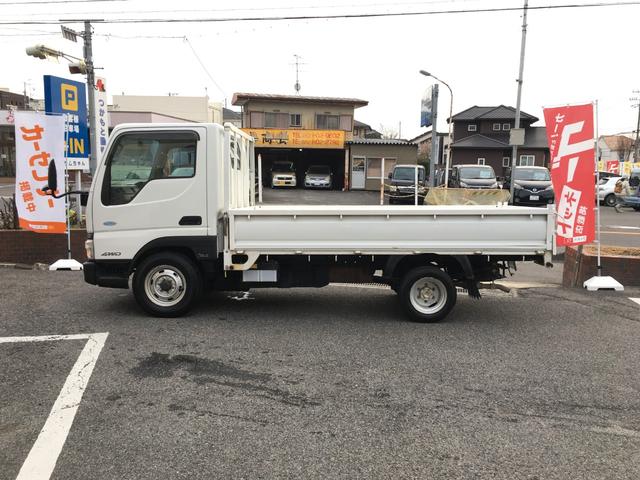 タイタンダッシュ 　ＤＸ　５速マニュアル車　４ＷＤ　平ボディ　鉄板張り　後輪ダブルタイヤ　積載量１５００ｋｇ　荷台　長さ／３１０ｃｍ　幅／１６０ｃｍ　高さ／３７ｃｍ　パワーウィンドウ　集中ドアロック　フロントフォグ（10枚目）