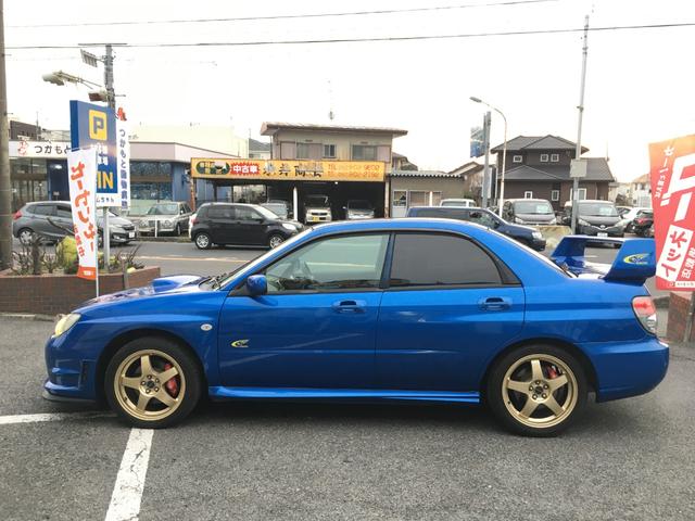 ＷＲＸ　ＷＲ－リミテッド　２００５　５ＭＴ　ＳＴＩリップ　ＳＴＩＧｅｎｏｍｅマフラー　ＳＴＩＧｅｎｏｍｅブースト計　ナビ　ＤＶＤ再生　ミュージックサーバー　純正１７インチアルミホイール　ＨＩＤヘッドライト　キーレス(10枚目)