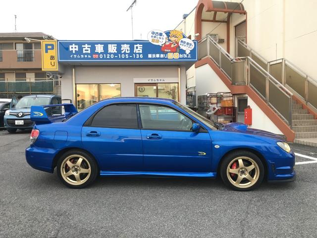 ＷＲＸ　ＷＲ－リミテッド　２００５　５ＭＴ　ＳＴＩリップ　ＳＴＩＧｅｎｏｍｅマフラー　ＳＴＩＧｅｎｏｍｅブースト計　ナビ　ＤＶＤ再生　ミュージックサーバー　純正１７インチアルミホイール　ＨＩＤヘッドライト　キーレス(13枚目)