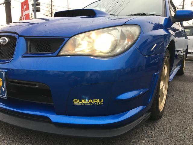 ＷＲＸ　ＷＲ－リミテッド　２００５　５ＭＴ　ＳＴＩリップ　ＳＴＩＧｅｎｏｍｅマフラー　ＳＴＩＧｅｎｏｍｅブースト計　ナビ　ＤＶＤ再生　ミュージックサーバー　純正１７インチアルミホイール　ＨＩＤヘッドライト　キーレス(16枚目)