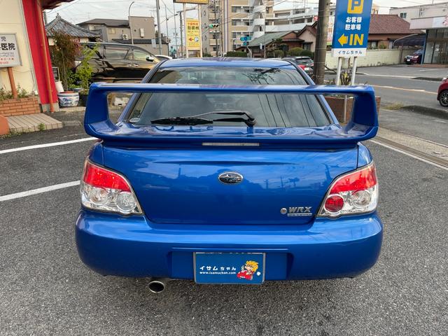 インプレッサ ＷＲＸ　５ＭＴ　ワンオーナー　アプライドモデルＧ型　タイミングベルト交換済み　大型リアウィング　ＨＩＤヘッドライト　リアフォグライト　パワーウィンドウ　純正１７インチアルミホイール　キーレスエントリー（12枚目）
