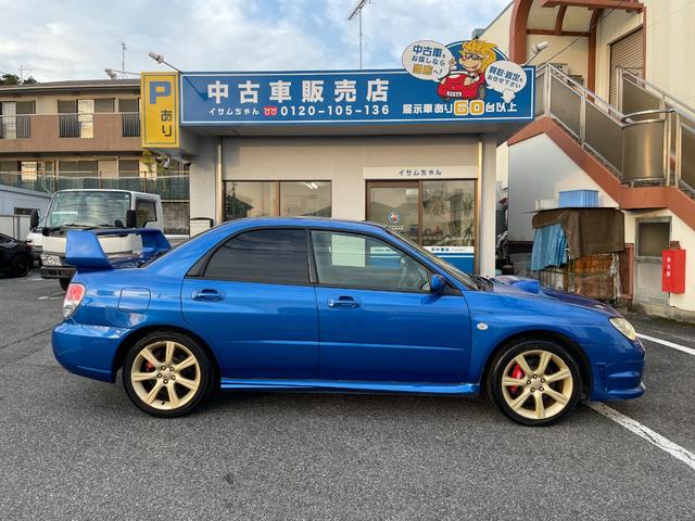 インプレッサ ＷＲＸ　５ＭＴ　ワンオーナー　アプライドモデルＧ型　タイミングベルト交換済み　大型リアウィング　ＨＩＤヘッドライト　リアフォグライト　パワーウィンドウ　純正１７インチアルミホイール　キーレスエントリー（14枚目）