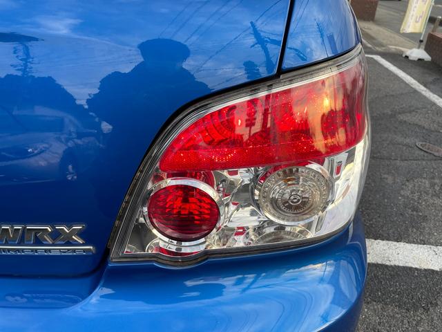 インプレッサ ＷＲＸ　５ＭＴ　ワンオーナー　アプライドモデルＧ型　タイミングベルト交換済み　大型リアウィング　ＨＩＤヘッドライト　リアフォグライト　パワーウィンドウ　純正１７インチアルミホイール　キーレスエントリー（20枚目）