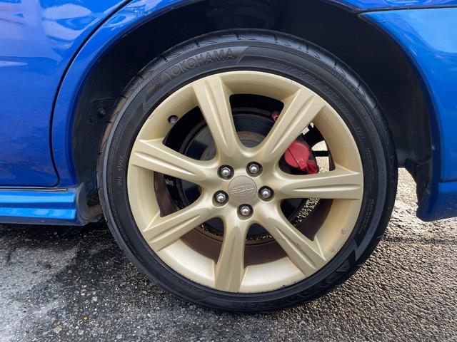 インプレッサ ＷＲＸ　５ＭＴ　ワンオーナー　アプライドモデルＧ型　タイミングベルト交換済み　大型リアウィング　ＨＩＤヘッドライト　リアフォグライト　パワーウィンドウ　純正１７インチアルミホイール　キーレスエントリー（29枚目）