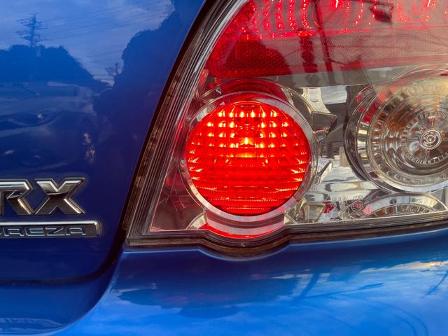 インプレッサ ＷＲＸ　５ＭＴ　ワンオーナー　アプライドモデルＧ型　タイミングベルト交換済み　大型リアウィング　ＨＩＤヘッドライト　リアフォグライト　パワーウィンドウ　純正１７インチアルミホイール　キーレスエントリー（30枚目）