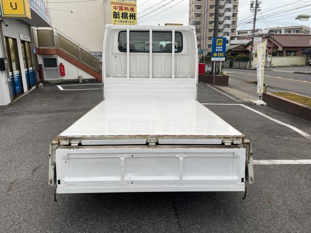 タイタンダッシュ WキャブワイドローDX 5MT 6人乗り 荷台鉄板張り 平ボディ 低床 後輪ダブルタイヤ 最大積載量1250kg 荷台サイズ 長さ210cm 幅160cm 高さ37cm 前席パワーウィンドウ エアコン フロントフォグライト(68枚目)