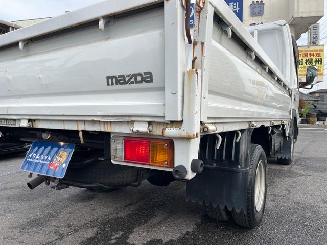 タイタンダッシュ ワイドローＤＸ　ＡＴ　ワンオーナー　平ボディ　荷台鉄板張り　低床　後輪ダブルタイヤ　最大積載量１３５０ｋｇ　荷台サイズ　長さ２８５ｃｍ　幅１６０ｃｍ　高さ３８ｃｍ　ＥＴＣ　純正オーディオ　フォグライト（22枚目）