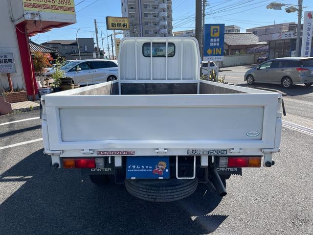 キャンターガッツ ロング全低床ＳＡ　５ＭＴ　平ボディ　荷台鉄板張り　低床　後輪ダブルタイヤ　最大積載量１５００ｋｇ　荷台サイズ　長さ３１０ｃｍ　幅１６０ｃｍ　高さ３７ｃｍ　地上高８２ｃｍ　運転席エアバック　パワーウィンドウ（12枚目）
