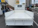 ショートフルスーパーローＤＸ　ＡＴ　平ボディ　荷台鉄板張り　高床　リアシングルタイヤ　最大積載量１５００ｋｇ　荷台サイズ　長さ２８５ｃｍ　幅１６０ｃｍ　高さ３８ｃｍ　フロントフォグライト　パワーウィンドウ　エアコン　純正ラジオ（62枚目）
