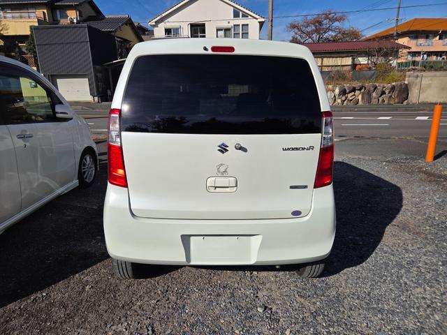 ワゴンＲ ＦＸ　社外ナビ　ＴＶ（ワンセグ）　アイドリングストップ機能　社外アルミＷ　ＥＴＣ　オートエアコン　ＰＷ　後部座席スモーク　法令点検整備実施　保証付　２年付（3枚目）
