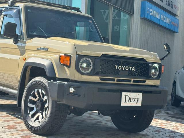ランドクルーザー７０ ＡＸ　カスタム車両　社外ナビ　ディーゼルターボ　４ＷＤ　寒冷地仕様　ＪＡＯＳルーフブラック　社外サイドステップ　　　自動防眩インナーミラー　電動デフロック　ウッドコンビハンドル　インテリアパネルセット（17枚目）
