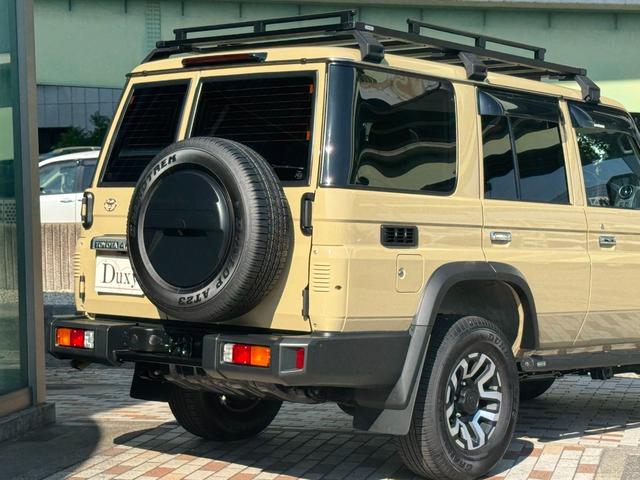 ランドクルーザー７０ ＡＸ　カスタム車両　社外ナビ　ディーゼルターボ　４ＷＤ　寒冷地仕様　ＪＡＯＳルーフブラック　社外サイドステップ　　　自動防眩インナーミラー　電動デフロック　ウッドコンビハンドル　インテリアパネルセット（31枚目）