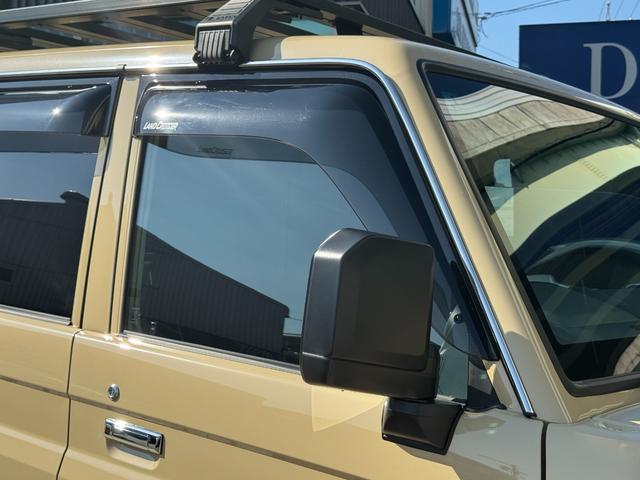 ランドクルーザー７０ ＡＸ　カスタム車両　社外ナビ　ディーゼルターボ　４ＷＤ　寒冷地仕様　ＪＡＯＳルーフブラック　社外サイドステップ　　　自動防眩インナーミラー　電動デフロック　ウッドコンビハンドル　インテリアパネルセット（77枚目）