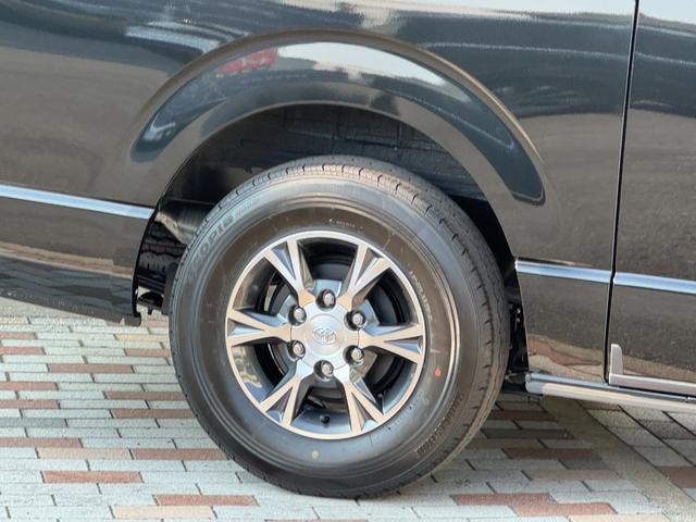 ハイエースバン スーパーＧＬダークプライム２　４ＷＤ　デジタルインナーミラー　ＯＰ１５インチＡＷ　寒冷地仕様　両側パワースライドドア　ハーフレザーシート　ＬＥＤヘッド　ＬＥＤフォグ　ＴＳＳ　クリアランスソナー　純正ホイール　ＡＣ１００Ｖ（78枚目）