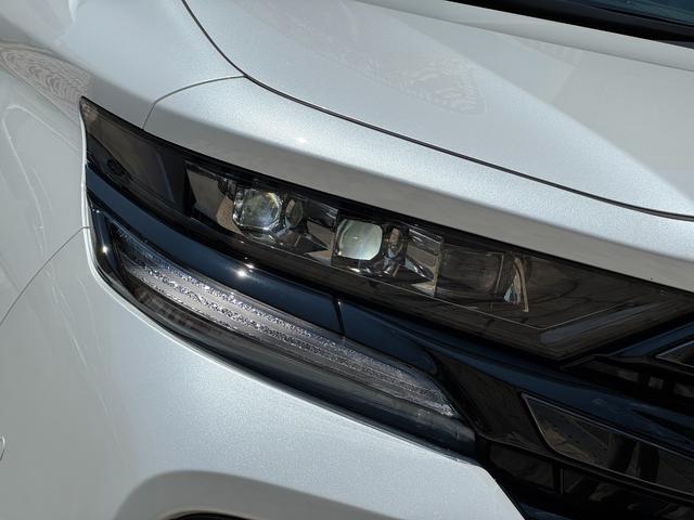 ヴェルファイアハイブリッド Ｚ　プレミア　左右独立ムーンルーフ　デジタルインナーミラー　純正１４インチナビ　パノラミックビュー　１３．２型有機ＥＬ後席ディスプレイ　ユニバーサルステップ　　ブラウン内装　トヨタチームメイト　アドバンスパーク（17枚目）