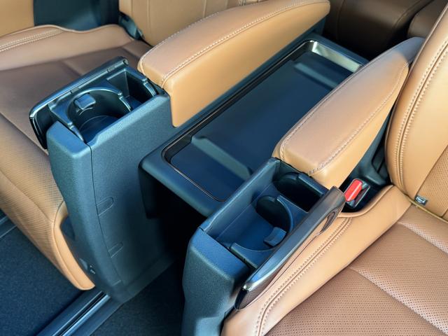 ヴェルファイアハイブリッド Ｚ　プレミア　左右独立ムーンルーフ　ＪＢＬサウンド　　デジタルインナーミラー　１４インチフリップダウンモニター　寒冷地　純正ナビ　パノラミックビュー　ステップ　ブラウン内装　トヨタチームメイト　ＡＣ１００Ｖ　ＨＵＤ（65枚目）