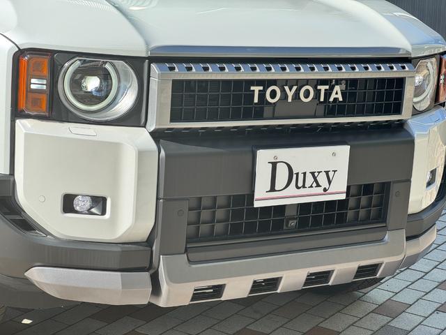 ランドクルーザー２５０ ＶＸ　モデリスタフロントバンパーガード　モデリスタフロントアンダーカバー　モデリスタリヤバンパー　モデリスタオーバーフェンダー　丸目ヘッドライト　寒冷地仕様　トヨタメームメイト　デジタルインナーミラー（13枚目）