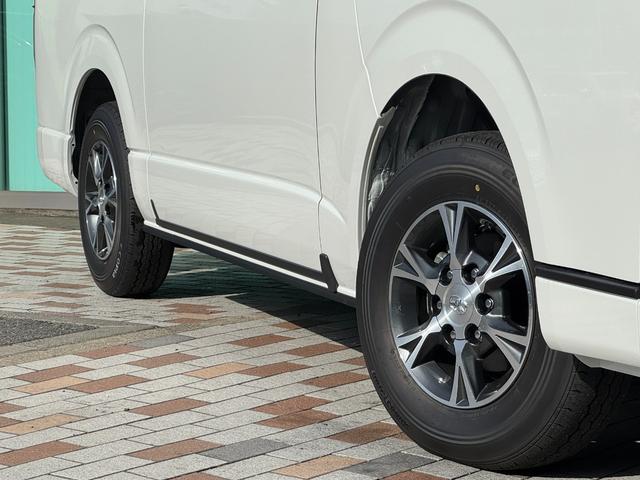 ハイエースバン ロングスーパーGLダークプライムS 4WD デジタルインナーミラー OP15インチAW 寒冷地仕様 両側パワースライドドア 専用ショックアブソーバー ハーフレザーシート LEDヘッド LEDフォグ スカッフプレート AC100V(8枚目)