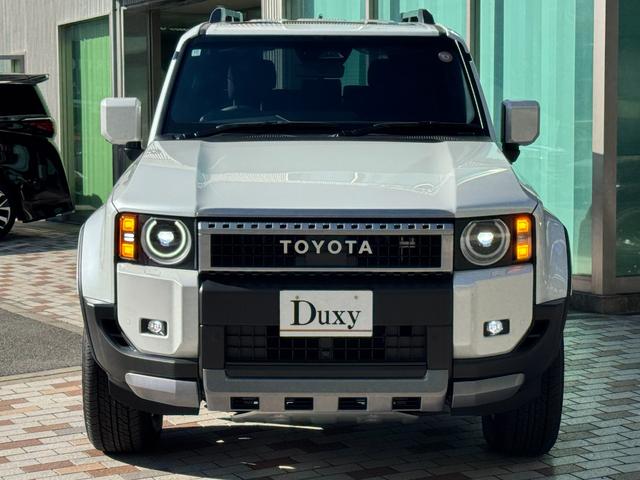 ランドクルーザー２５０ ＶＸ　モデリスタフロントバンパーガード　モデリスタフロントアンダーカバー　モデリスタリヤバンパー　モデリスタオーバーフェンダー　丸目ヘッドライト　寒冷地仕様　トヨタメームメイト　デジタルインナーミラー（13枚目）