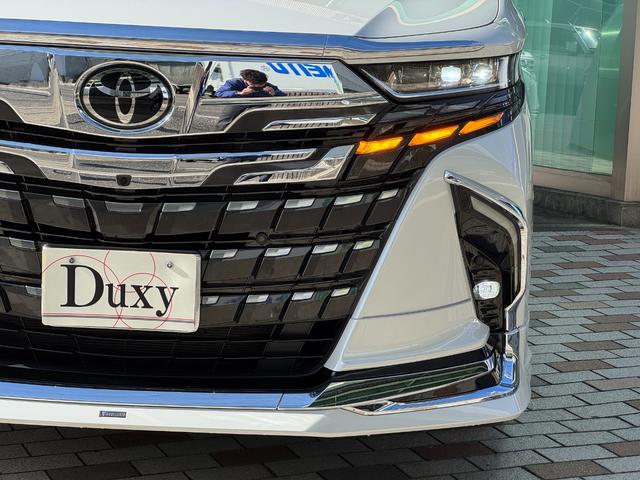 アルファードハイブリッド エグゼクティブラウンジ　モデリスタエアロ　４ＷＤ　メーカーナビ　１４型後席モニター　ＪＢＬプレミアムサウンド　左右独立ムーンルーフ　パノマミックビューモニター　トヨタメームメイト　アドバンスドパーク　寒冷地仕様　　Ｄミラー（15枚目）