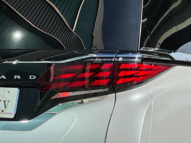 アルファードハイブリッド エグゼクティブラウンジ　モデリスタエアロ　４ＷＤ　メーカーナビ　１４型後席モニター　ＪＢＬプレミアムサウンド　左右独立ムーンルーフ　パノマミックビューモニター　トヨタメームメイト　アドバンスドパーク　寒冷地仕様　　Ｄミラー（21枚目）