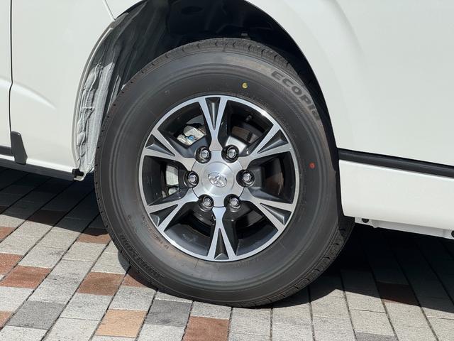ハイエースバン ロングスーパーＧＬダークプライムＳ　４ＷＤ　デジタルインナーミラー　ＯＰ１５インチＡＷ　寒冷地仕様　両側パワースライドドア　専用ショックアブソーバー　ハーフレザーシート　ＬＥＤヘッド　ＬＥＤフォグ　スカッフプレート　ＡＣ１００Ｖ（5枚目）