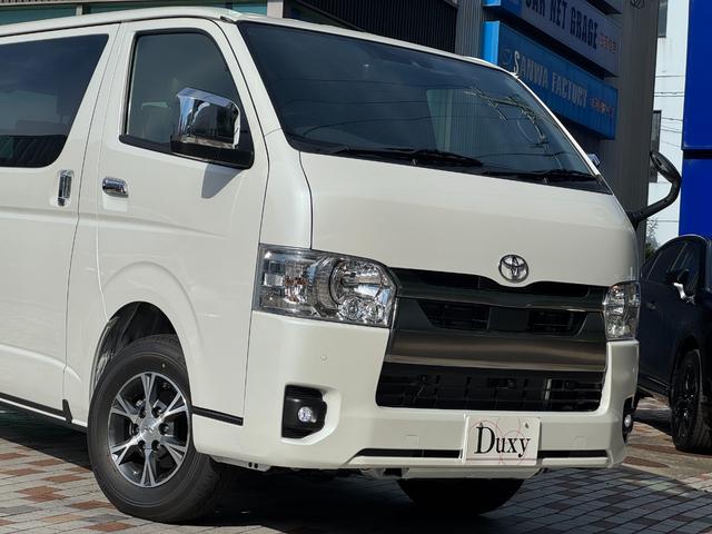 ハイエースバン ロングスーパーＧＬダークプライムＳ　４ＷＤ　デジタルインナーミラー　ＯＰ１５インチＡＷ　寒冷地仕様　両側パワースライドドア　専用ショックアブソーバー　ハーフレザーシート　ＬＥＤヘッド　ＬＥＤフォグ　スカッフプレート　ＡＣ１００Ｖ（62枚目）