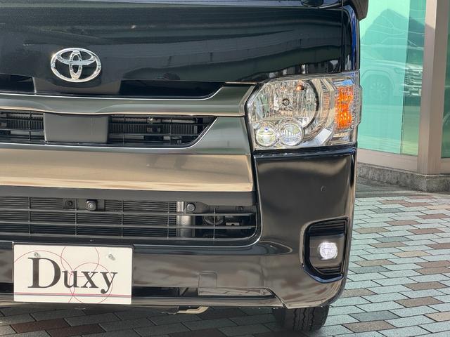 ハイエースバン ロングスーパーＧＬダークプライムＳ　４ＷＤ　デジタルインナーミラー　ＯＰ１５インチＡＷ　寒冷地仕様　両側パワースライドドア　専用ショックアブソーバー　ハーフレザーシート　ＬＥＤヘッド　ＬＥＤフォグ　スカッフプレート　ＡＣ１００Ｖ（66枚目）