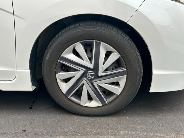 シャトル ハイブリッド　アップル１年保証付　車検整備付　禁煙車　社外ナビ　バックカメラ　ＥＴＣ　サイドバイザー　電格ミラー　取説　保証書　スペアキー（7枚目）