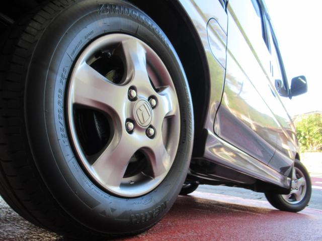 創業68年の実績!R260沿いのピンクの看板とショールームが目印!!全天候型屋内展示場! 当店でご購入のお車の、車検&法定点検時のオイル交換は一生無料!!