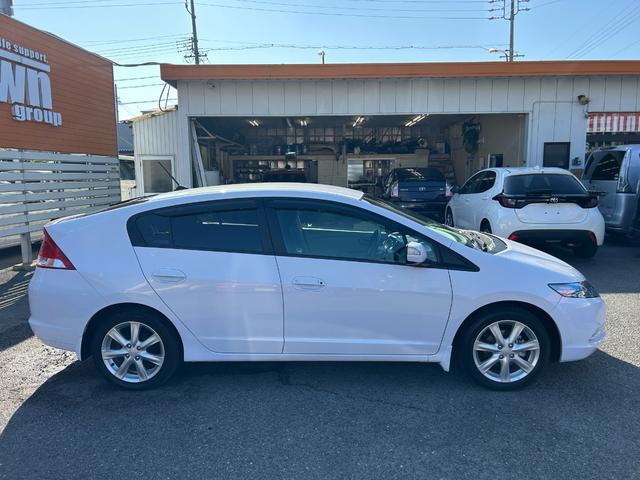 インサイト LS 純正HDDナビ ワンセグTV バックモニター 純正HIDヘッドライト オートライト フォグ 純正アルミホイール ETC 横滑り防止 パドルシフト 革巻きハンドル オートエアコン 禁煙車 車検2年付(7枚目)