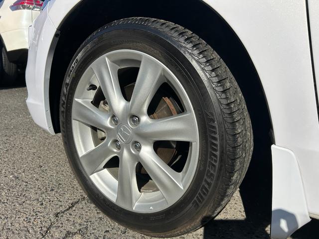 インサイト LS 純正HDDナビ ワンセグTV バックモニター 純正HIDヘッドライト オートライト フォグ 純正アルミホイール ETC 横滑り防止 パドルシフト 革巻きハンドル オートエアコン 禁煙車 車検2年付(10枚目)