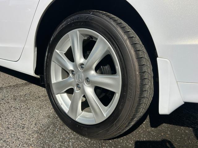 インサイト LS 純正HDDナビ ワンセグTV バックモニター 純正HIDヘッドライト オートライト フォグ 純正アルミホイール ETC 横滑り防止 パドルシフト 革巻きハンドル オートエアコン 禁煙車 車検2年付(11枚目)