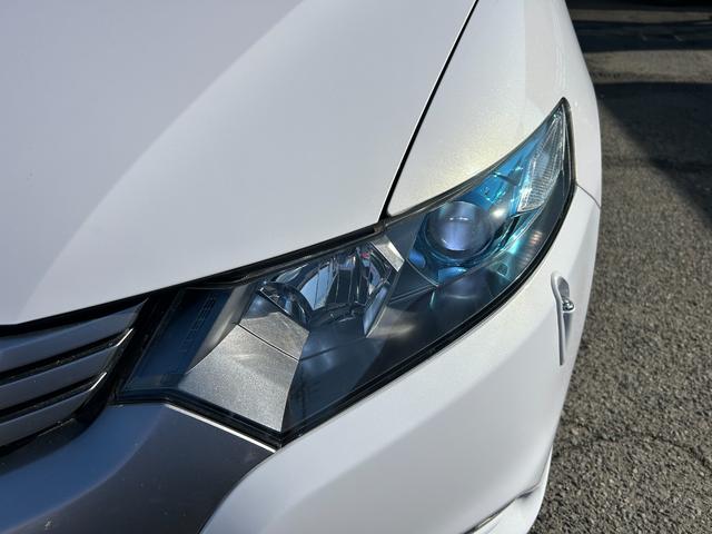 インサイト LS 純正HDDナビ ワンセグTV バックモニター 純正HIDヘッドライト オートライト フォグ 純正アルミホイール ETC 横滑り防止 パドルシフト 革巻きハンドル オートエアコン 禁煙車 車検2年付(15枚目)