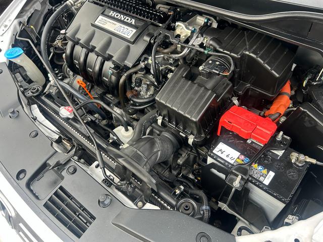 インサイト LS 純正HDDナビ ワンセグTV バックモニター 純正HIDヘッドライト オートライト フォグ 純正アルミホイール ETC 横滑り防止 パドルシフト 革巻きハンドル オートエアコン 禁煙車 車検2年付(20枚目)