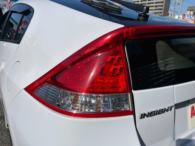 インサイト LS 純正HDDナビ ワンセグTV バックモニター 純正HIDヘッドライト オートライト フォグ 純正アルミホイール ETC 横滑り防止 パドルシフト 革巻きハンドル オートエアコン 禁煙車 車検2年付(62枚目)