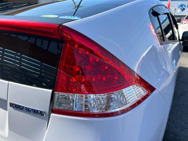 インサイト LS 純正HDDナビ ワンセグTV バックモニター 純正HIDヘッドライト オートライト フォグ 純正アルミホイール ETC 横滑り防止 パドルシフト 革巻きハンドル オートエアコン 禁煙車 車検2年付(63枚目)