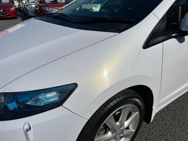 インサイト LS 純正HDDナビ ワンセグTV バックモニター 純正HIDヘッドライト オートライト フォグ 純正アルミホイール ETC 横滑り防止 パドルシフト 革巻きハンドル オートエアコン 禁煙車 車検2年付(66枚目)