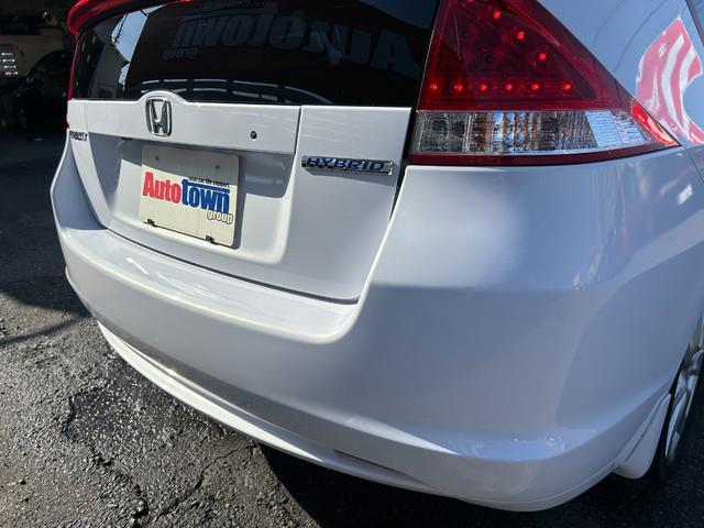 インサイト LS 純正HDDナビ ワンセグTV バックモニター 純正HIDヘッドライト オートライト フォグ 純正アルミホイール ETC 横滑り防止 パドルシフト 革巻きハンドル オートエアコン 禁煙車 車検2年付(71枚目)