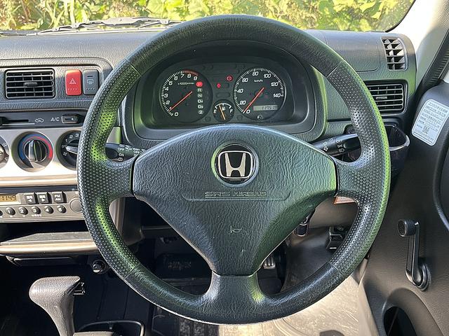 アクティバン SDX 4WD 12か月走行無制限保証付き 事業用登録可能車両 FMAMラジオ ボディ同色バンパー カーエアコン 純正アルミ ハイルーフ スペアタイヤ カップホルダー 光軸調節 手巻きウインドウ サンバイザー(8枚目)