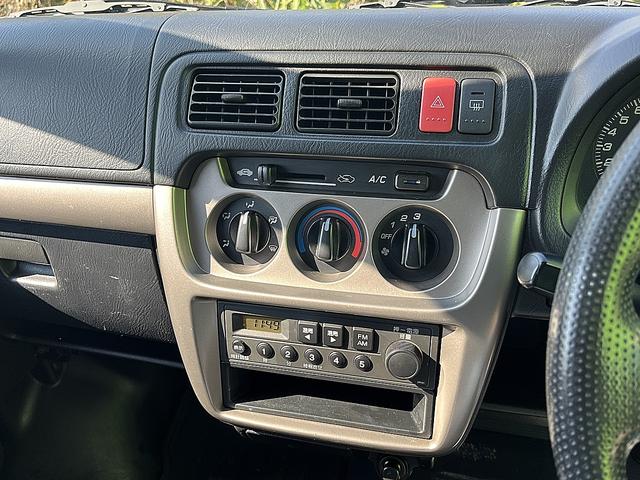 アクティバン SDX 4WD 12か月走行無制限保証付き 事業用登録可能車両 FMAMラジオ ボディ同色バンパー カーエアコン 純正アルミ ハイルーフ スペアタイヤ カップホルダー 光軸調節 手巻きウインドウ サンバイザー(14枚目)