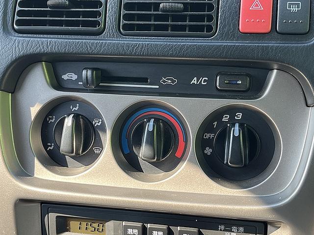 アクティバン SDX 4WD 12か月走行無制限保証付き 事業用登録可能車両 FMAMラジオ ボディ同色バンパー カーエアコン 純正アルミ ハイルーフ スペアタイヤ カップホルダー 光軸調節 手巻きウインドウ サンバイザー(15枚目)