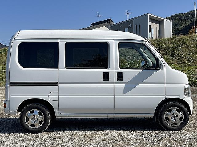 アクティバン SDX 4WD 12か月走行無制限保証付き 事業用登録可能車両 FMAMラジオ ボディ同色バンパー カーエアコン 純正アルミ ハイルーフ スペアタイヤ カップホルダー 光軸調節 手巻きウインドウ サンバイザー(34枚目)