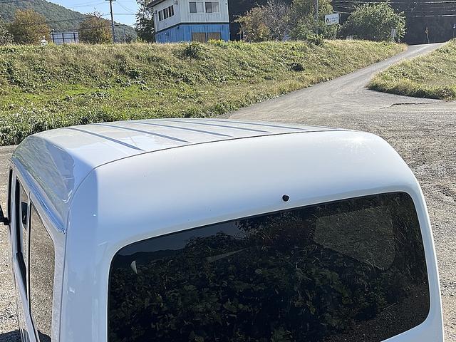 アクティバン SDX 4WD 12か月走行無制限保証付き 事業用登録可能車両 FMAMラジオ ボディ同色バンパー カーエアコン 純正アルミ ハイルーフ スペアタイヤ カップホルダー 光軸調節 手巻きウインドウ サンバイザー(43枚目)